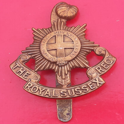 The Royal Sussex Regiment - WW1 Economy Issue Gilding Metal Cap Badge