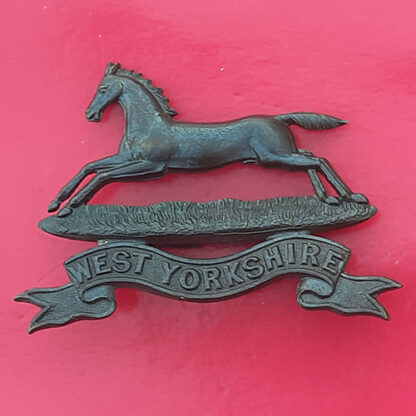 The West Yorkshire Regiment - Officer's Service Dress Bronzed Cap Badge