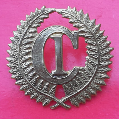 (New Zealand) C1 Camp (Featherston) - Gilding Metal Cap Badge