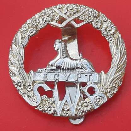 The South Wales Borderers - Silver & Gold Anodised Cap Badge
