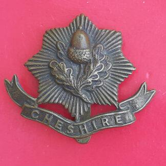The Cheshire Regiment - Economy Issue Gilding Metal Cap Badge