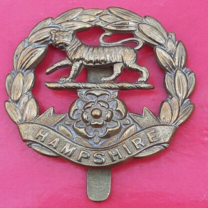 The Hampshire Regiment - WW1 Economy Issue Gilding Metal Cap Badge