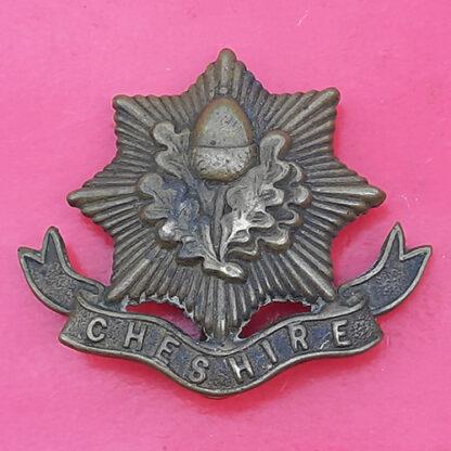 The Cheshire Regiment - WW1 Economy Issue Gilding Metal Cap Badge