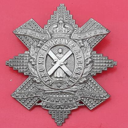 (Canada) The Black Watch Of Canada (Royal Highlanders) - King's Crown White Metal Cap Badge
