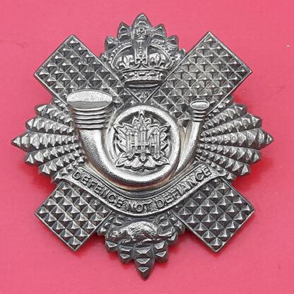 (Canada) The Highland Light Infantry Of Canada - King's Crown White Metal Cap Badge