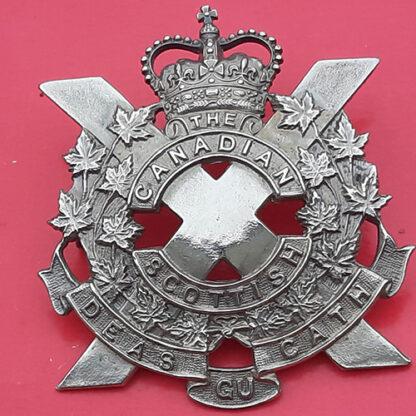 (Canada) The Canadian Scottish - Queen's Crown White Metal Cap Badge