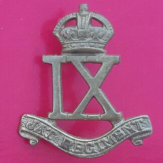 (India) The 9th JAT Regiment - King's Crown Cast White Metal Cap Badge