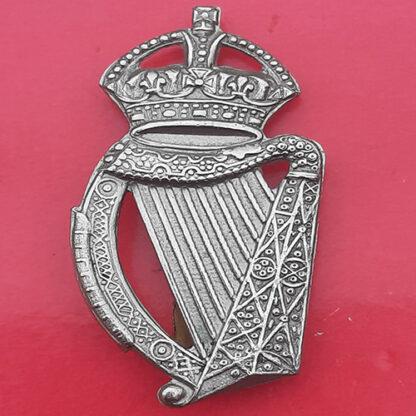 18th County Of London Irish Rifles - King's Crown White Metal Cap Badge