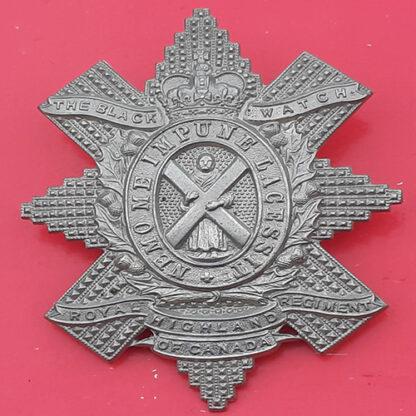 (Canada) The Royal Highland Regiment Of Canada (Black Watch) - Queen's Crown White Metal Cap Badge