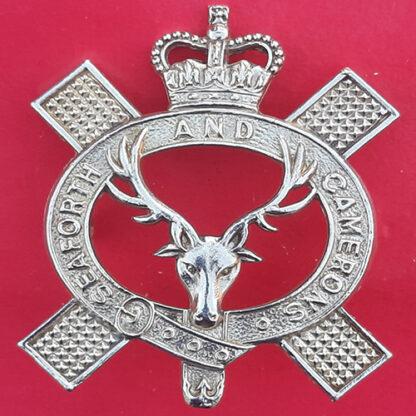 The Queen's Own Highlanders - Queen's Crown White Metal Piper's Badge
