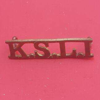 The King's Shropshire Light Infantry - Gilding Metal Shoulder Title.