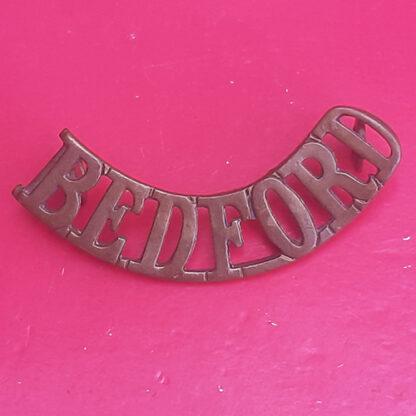 The Bedfordshire Regiment - Gilding Metal Shoulder Title.
