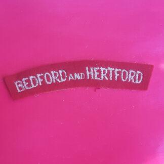 The Bedfordshire & Hertfordshire Regiment - Woven Shoulder Title.