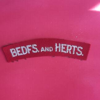 The Bedfordshire & Hertfordshire Regiment - Woven Shoulder Title.
