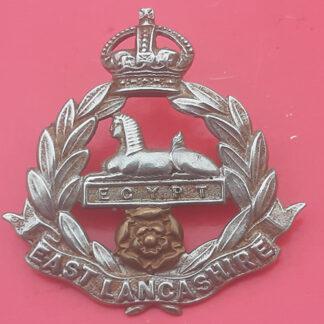 The East Lancashire Regiment - King's Crown Edwardian Bi-Metal Cap Badge.