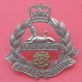 The East Lancashire Regiment - Queen's Crown Bi-Metal Cap Badge.