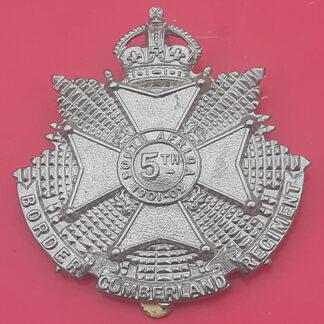 The 5th (Cumberland) The Border Reginent - King's Crown White Metal Cap Badge.