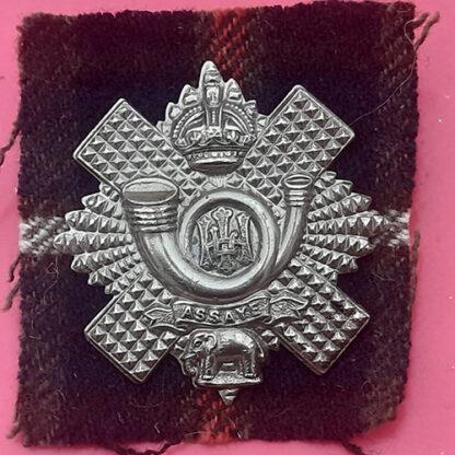 The Highland Light Infantry - King's Crown White Metal Cap Badge