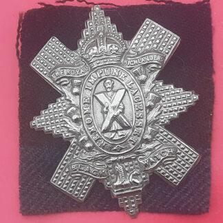 The Black Watch Royal Highland Regiment - King's Crown White Metal Cap Badge.