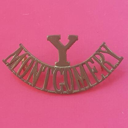 The Montgomeryshire Yeomanry - Gilding Metal Shoulder Title.