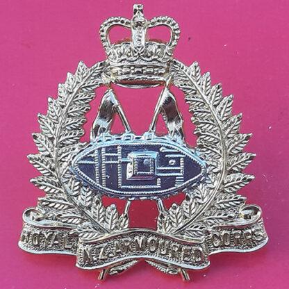 (New Zealand) - The Royal New Zealand Armoured Corps - Queen's Crown Gold & Silver Anodised Cap Badge.