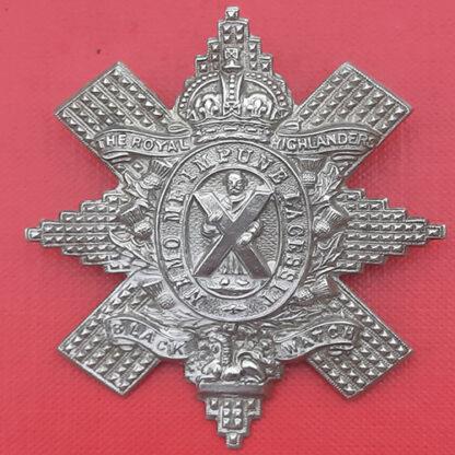 The Black Watch - King's Crown with "I.T" Spelling White Metal Cap Badge.