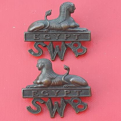 The South Wales Borderers - Officer's Service Dress Bronze Collar Badges.