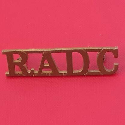 The Royal Army Dental Corps - Gilding Metal Shoulder Title.