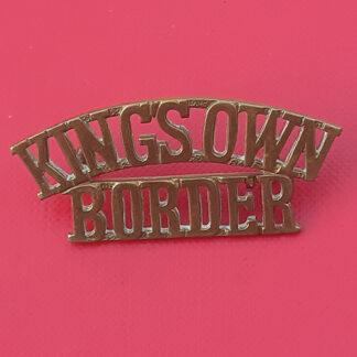 The King's Own Border Regiment - Gilding Metal Shoulder Title.