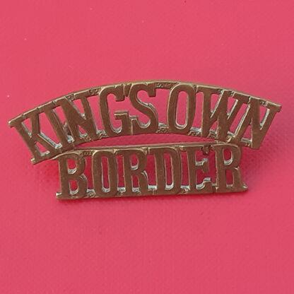 The King's Own Border Regiment - Gilding Metal Shoulder Title.