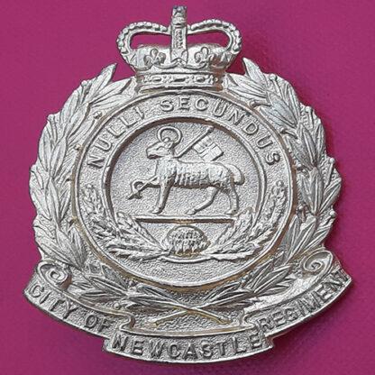 (Australia) The City of Newcastle Regiment - Queen's Crown Gilt Cap Badge.
