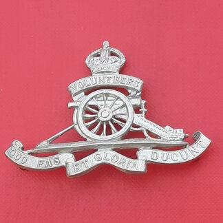 The Royal Artillery Volunteers  - King's Crown White Metal Cap Badge.