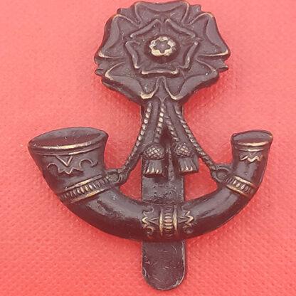 The 6th King's Liverpool Regiment - Blackened Brass Cap Badge.
