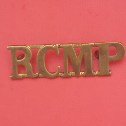 (Canada) The Royal Canadian Mounted Police - Gilding Metal Shoulder Title.