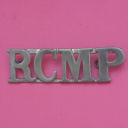 (Canada) The Royal Canadian Mounted Police - Gilding Metal Shoulder Title.
