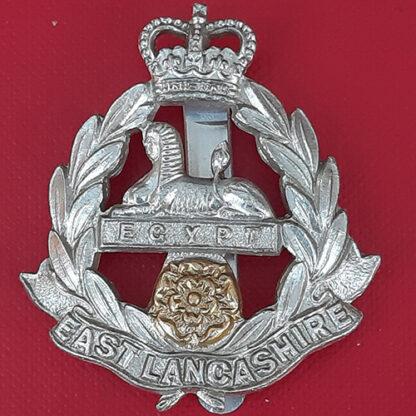 The East Lancashire Regiment - Gold & Silver Anodised Cap Badge.