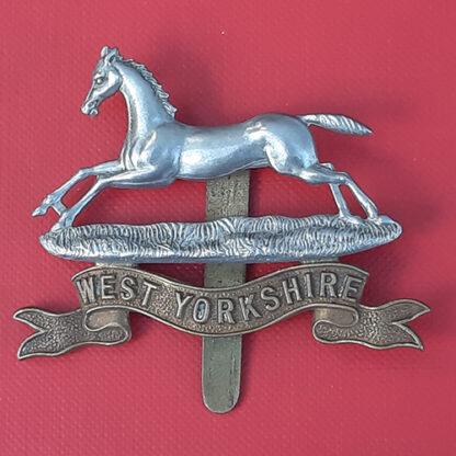 The West Yorkshire Regiment - Bi Metal Cap Badge.