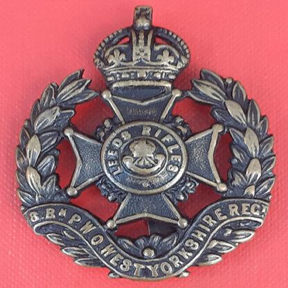 8th Battalion The P.W.O West Yorkshire Regiment ( The Leeds Rifles) - Blackened Brass Cap Badge.