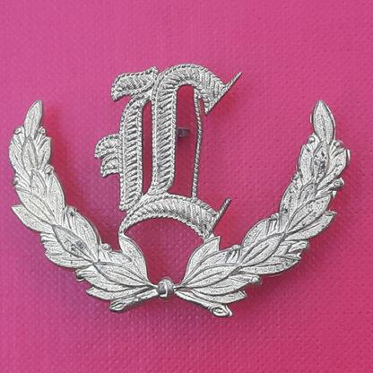 Gun Layer - Gilt Trade Badge.