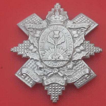(Australia) 30th Battalion New South Wales Scottish Regiment - King's Crown White Metal Cap Badge.