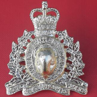 (Canada) Royal Canadian Mounted Police - Queen's Crown  Gold Anodised Cap Badge.