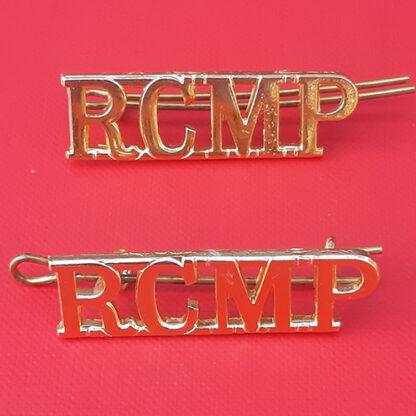 (Canada) Royal Canadian Mounted Police - Queen's Crown Gold Anodised Shoulder Titles.