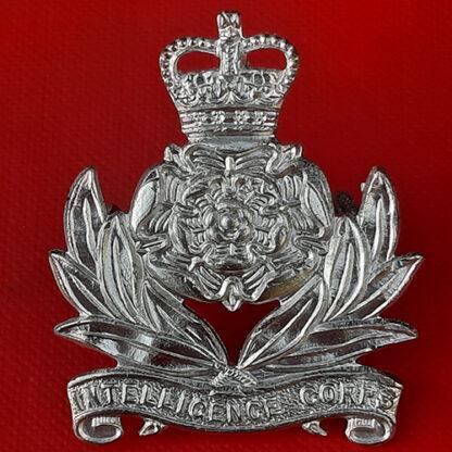 The Intelligence Corps - Queen's Crown Silver Plate Cap Badge.