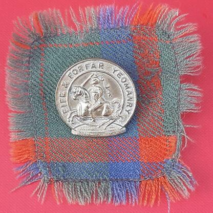 The Fife & Forfar Yeomanry - 1st Pattern Gilding Metal Cap Badge With Tartan Backing.