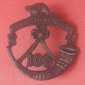 (Canadian Militia) 106th Regiment Winnipeg Light Infanry - Blackened Brass Collar Badge.