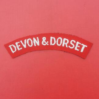 The Devon & Dorset Regiment - Woven Cloth Shoulder Title.