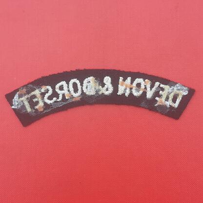 The Devon & Dorset Regiment - Woven Cloth Shoulder Title. - Image 2