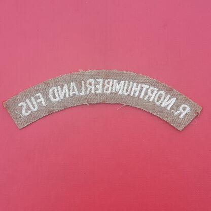 The Royal Northumberland Fusiliers - Woven Cloth Shoulder Title. - Image 2