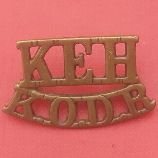 King Edward's Horse ( The King's Overseas Dominion Regiment) - Gilding Metal Shoulder Title.