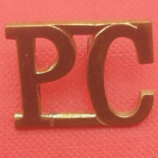 The Pioneer Corps - Gilding Metal Shoulder Title.